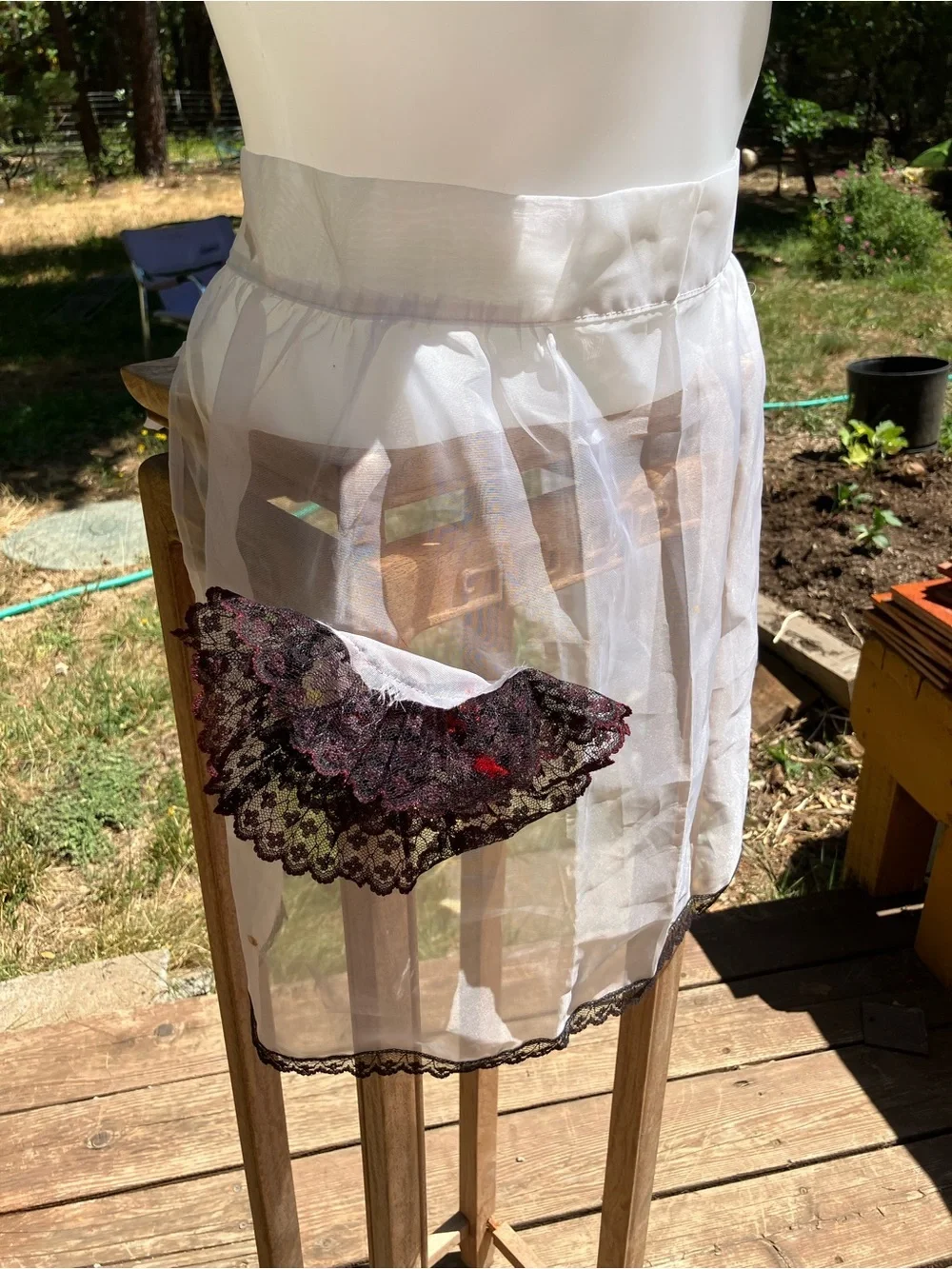 Vintage sheer apron with black and red lace pocket